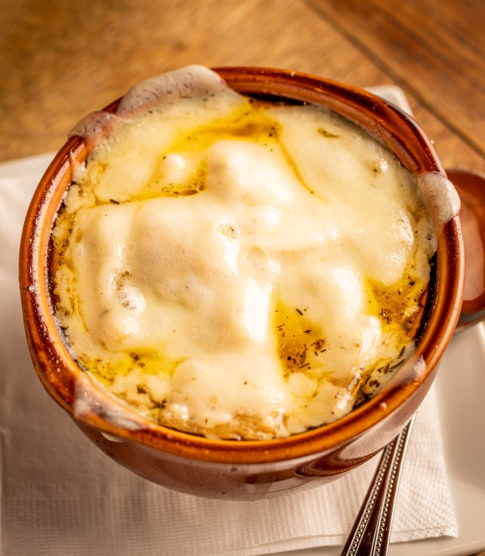 French Onion Soup at O'Brion's Pub & Grille — Mount Pleasant SC French onion soup with melted Swiss cheese and caramelized onions at O'Brion's Pub & Grille
