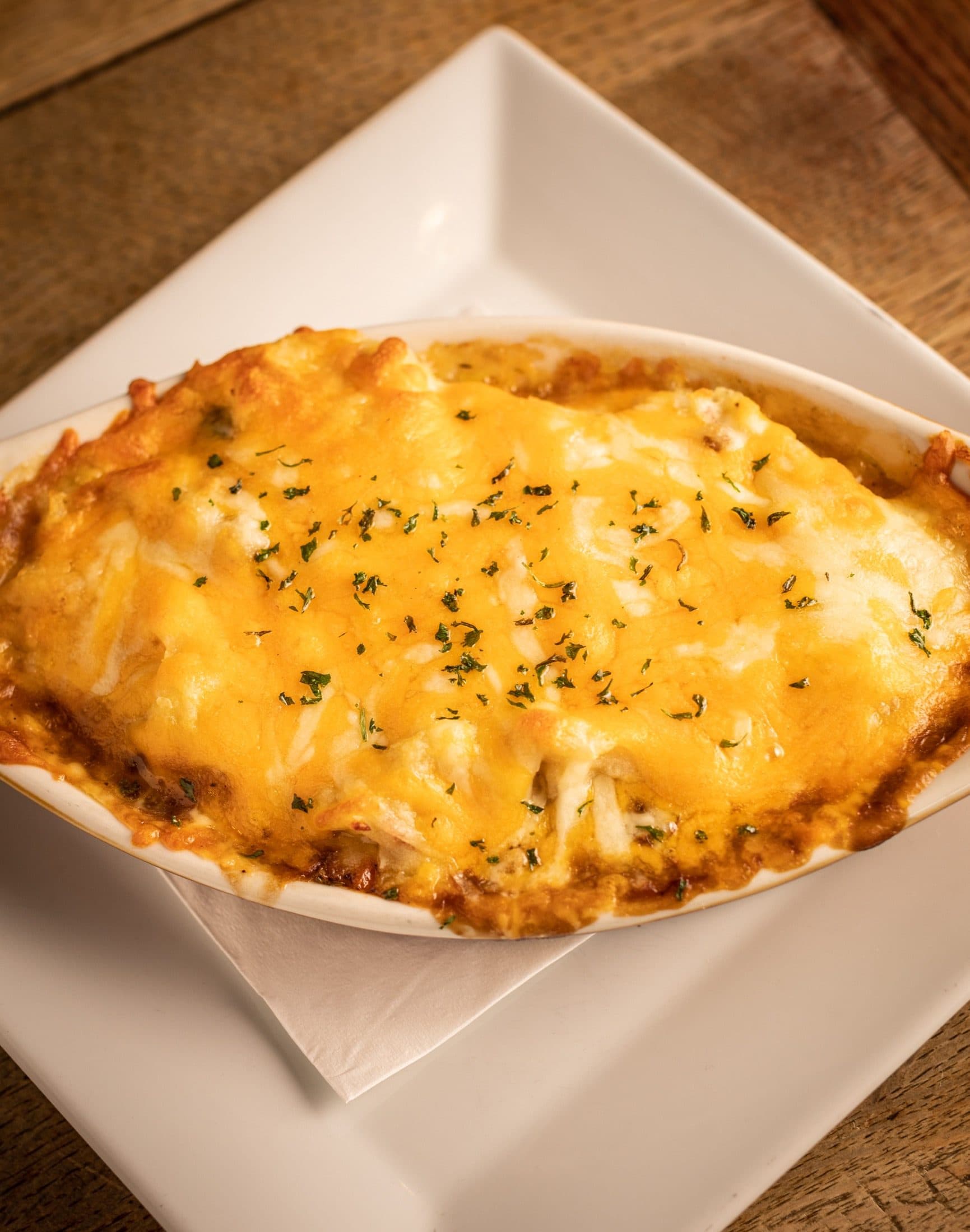 Shepherd's Pie at O'Brion's Pub & Grille — Irish Pub Comfort Food, Mount Pleasant SC Shepherd's pie with mashed potatoes and melted cheese at O'Brion's Pub & Grille in Mount Pleasant SC